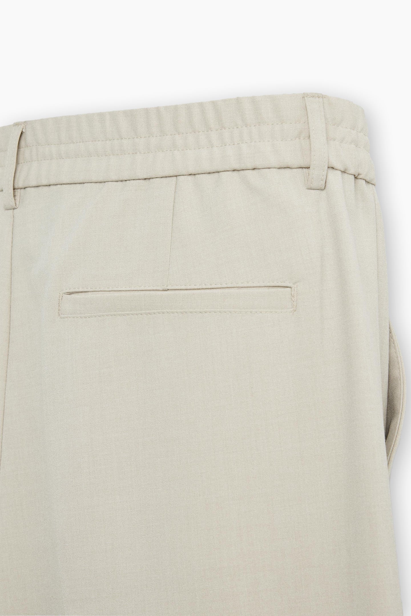 Beige Loose Fit Pleated Trousers